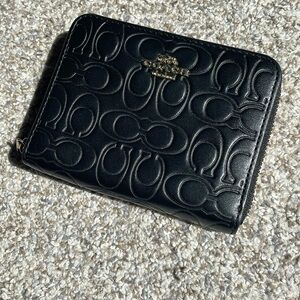 COACH - “C” zip around small wallet